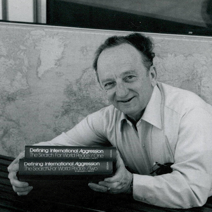 Ben posing with his book, "Defining International Aggression," unknown date (1970's)
