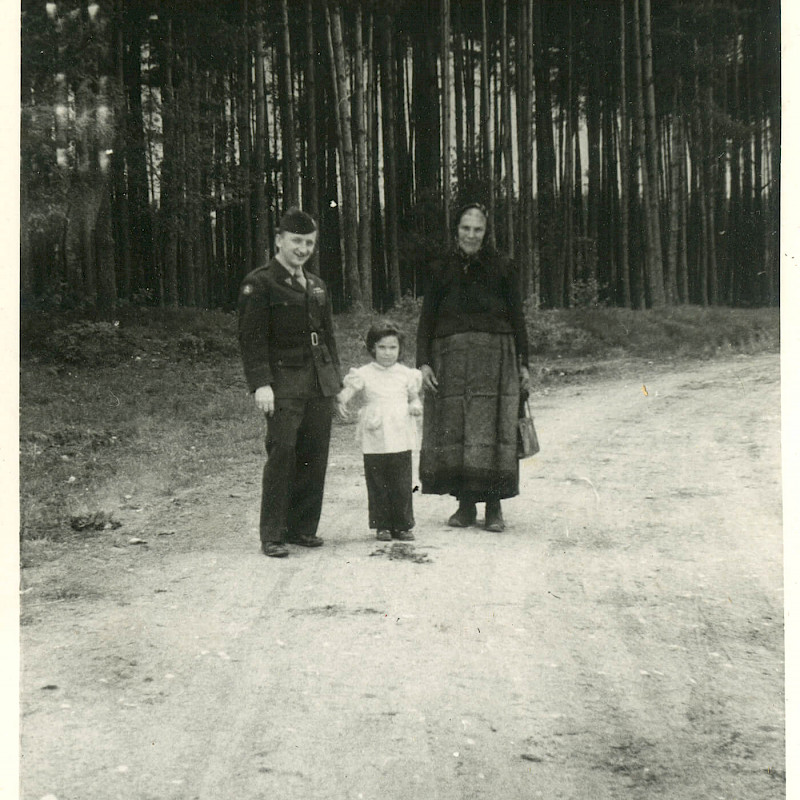 Ben with a local family in a rural area of Bavaria, 1946